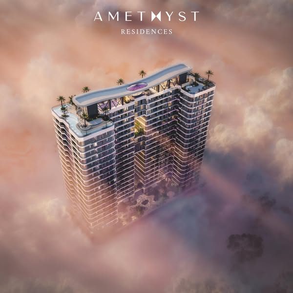 Amethyst Springs — curved-glass residential tower at dusk
